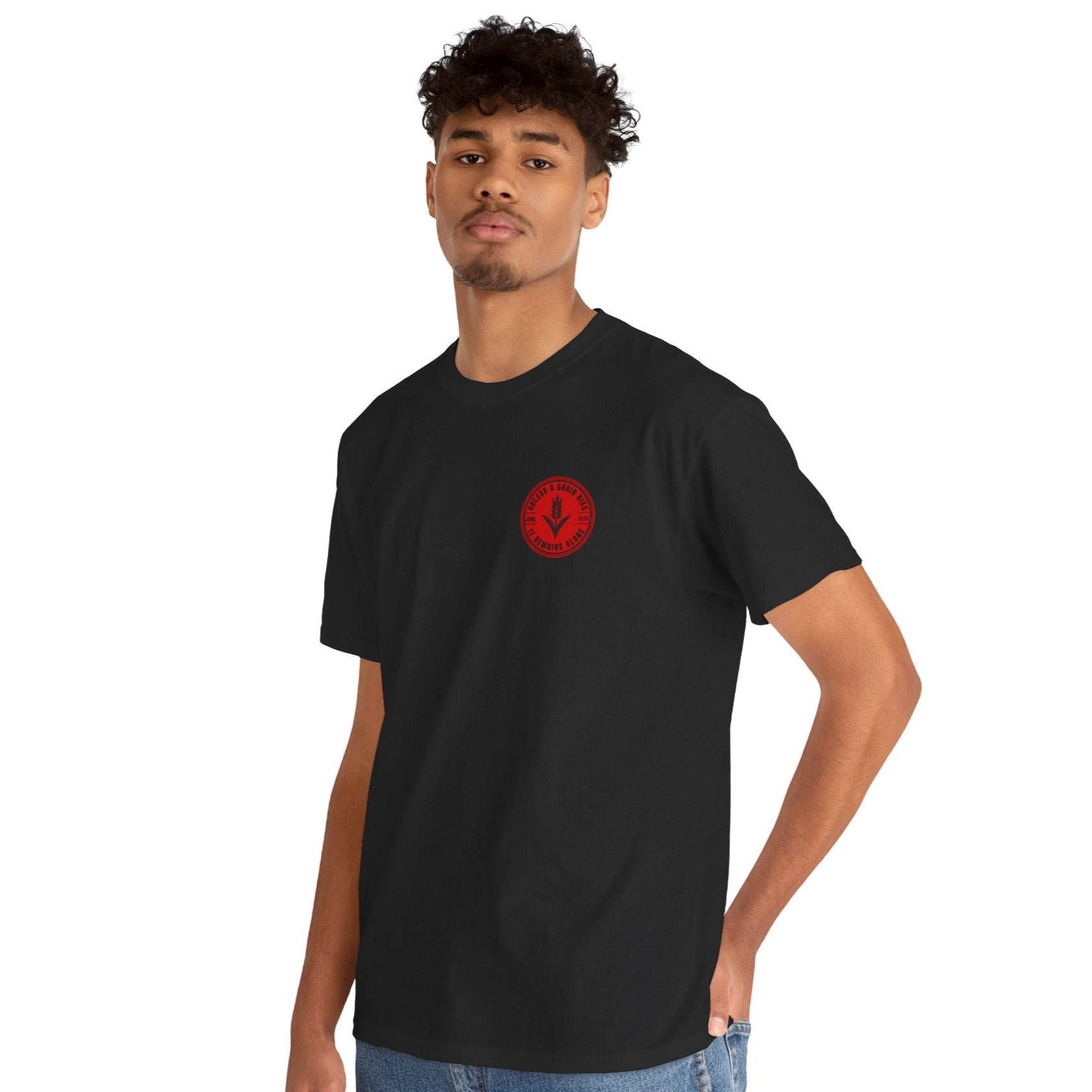 Person wearing a black t-shirt with a red logo on a white background